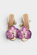 Gold slip-on sandal heels with lavender silk orchid flower accents.