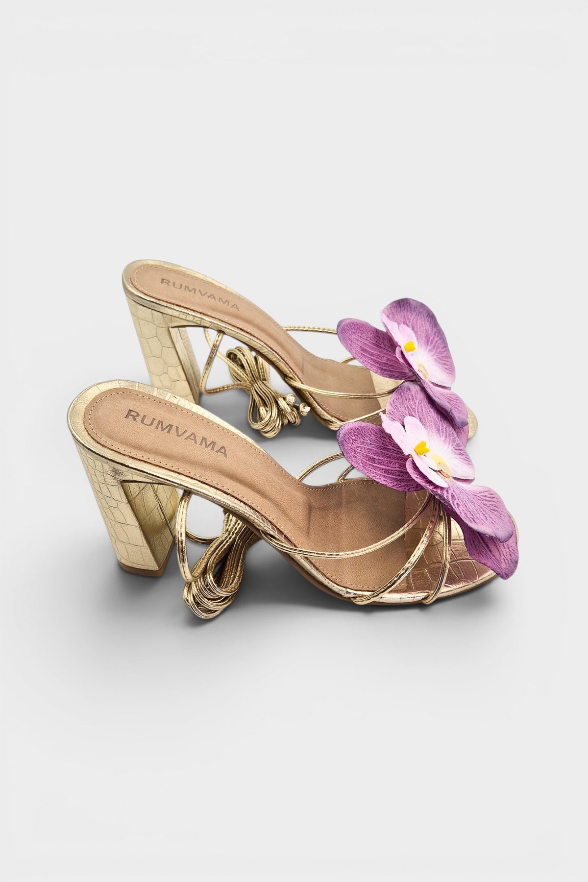 Gold slip-on sandal heels with lavender silk orchid flower accents.