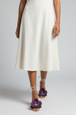 Gold slip-on sandal heels with purple silk orchid flower accents.