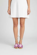 Gold slip-on sandal heels with lavender silk orchid flower accents.