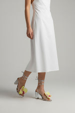 Silver slip-on sandal heels with printed orchid flower accents.