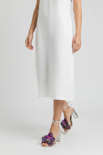 Silver slip-on sandal heels with purple silk orchid flower accents.