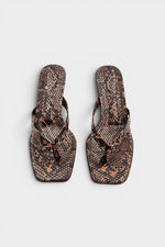 Snake print thong mule heels with matching insoles and kitten heels.